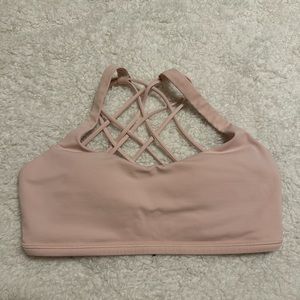 Selling light pink lulu sports bra